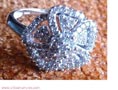 ANILLO ROSETON DE ORO BLANCO CON MUCHOS DIAMANTES MUY BRILLANTES