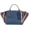 Bolso  GUESS azul y burdeos por  90.00€